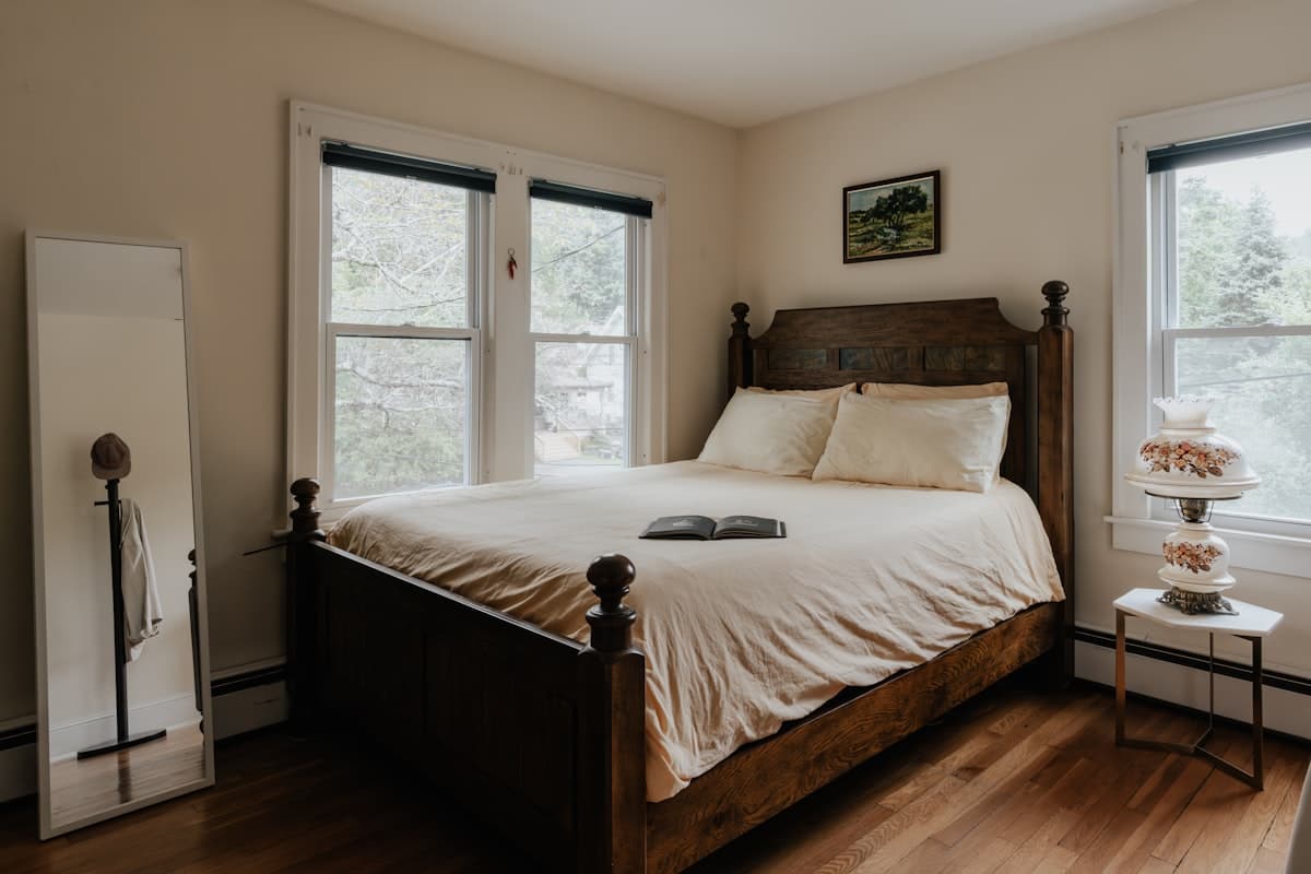 Compact air purifier next to bed